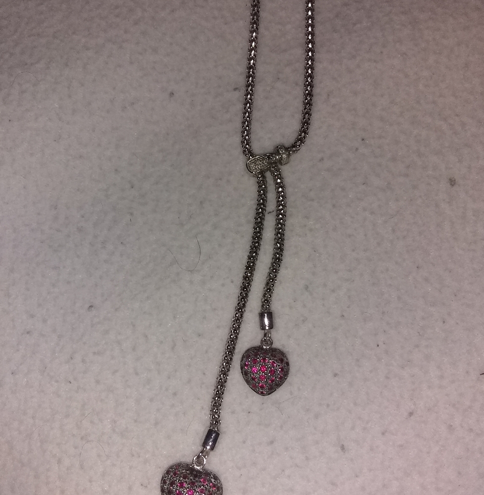 Sterling silver necklace with 2 hearts with purple